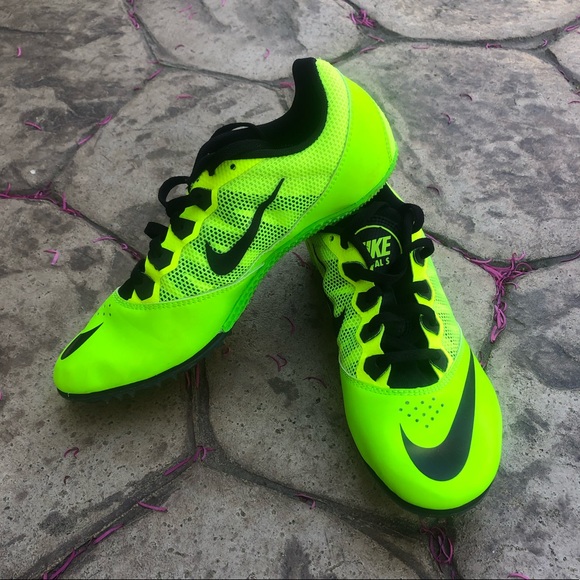 green nike spikes